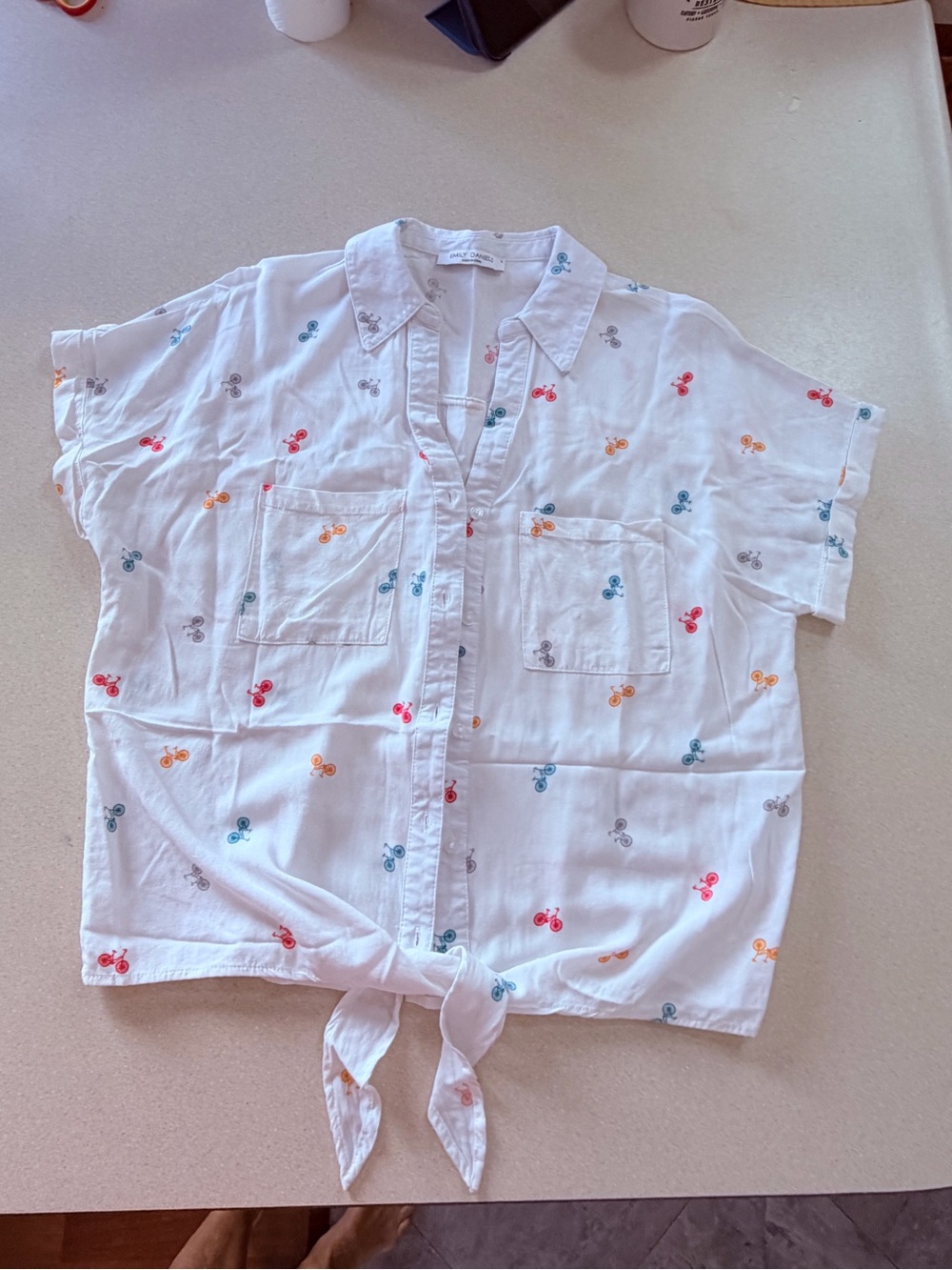 White Tie-Front Button Blouse with Multicolor Bicycles Print